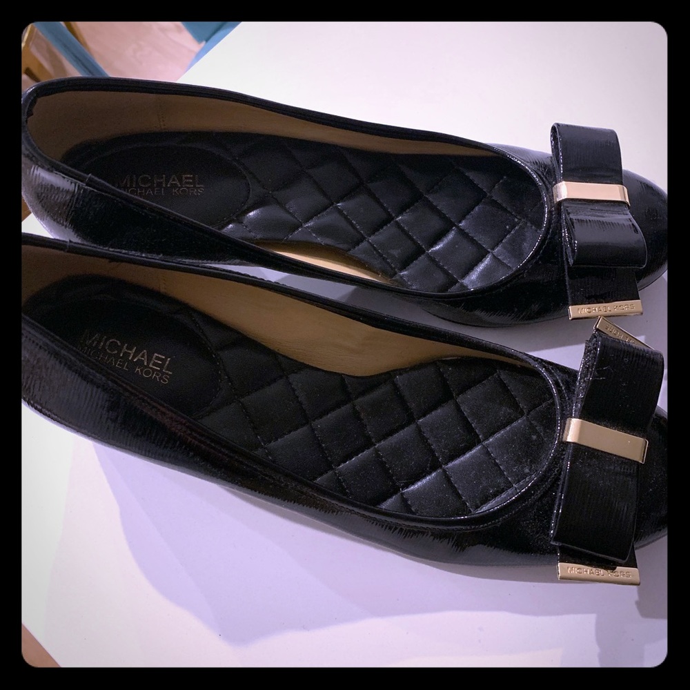 Michael Kors patent black pumps, with classy bow.